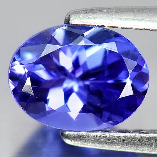 Natural Violetish Blue Tanzanite 1.43 Ct. Oval Shape 8 x 6.1Mm. Gemstone From Tanzania: Product ID: 807009045 Product Name: Natural Tanzanite Weight: 1.43 CT. Size: 8 x 6.1 x 4.2 MM. Shape: Oval Color: Blue Clarity:VVS Luster: Good Gems Origin: Tanzania Treatment: Heated Crystal Structur
