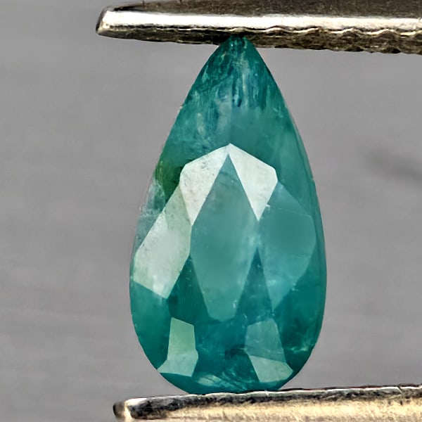 Natural Green Blueish Grandidierite 0.95 Ct. Pear Shape 8.7 x 4.5 Mm Gemstone From Madagascar: Product ID: 803100075 Product Name: Natural Tsavorite Weight: 0.95 CT. Size: 8.7 x 4.5 x 3.9 MM. Shape: Pear Color: Green Blueish Clarity:SI1 Luster: Good Gems Origin: Madagascar Treatment: Unheated C