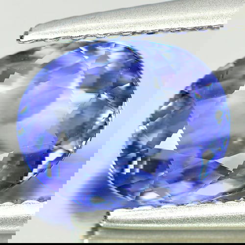 Violetish Blue Tanzanite 1.35 Ct. Clean Oval Shape 7.9 x 6.2 Mm. Natural Gemstone From Tanzania: Product ID: 807004380 Product Name: Natural Tanzanite Weight: 1.35 CT. Size: 7.9 x 6.2 x 3.5 MM. Shape: Oval Color: Violetish Blue Clarity:IF Luster: Very Good Gems Origin: Tanzania Treatment: Heated