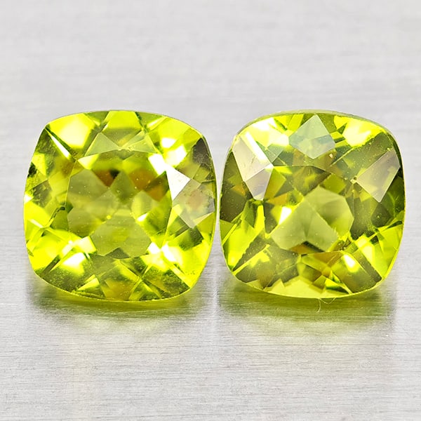 Natural Green Peridot 2.30 Ct. 2Pcs Cushion Shape Gemstones From Pakistan: Product ID: 805317396 Product Name: Natural Peridot Weight: 2.30 CT. Size: 6.3 x 6.3 x 3.7 to 6.1 x 6.1 x 4.4 MM. Shape: Cushion Shape Color: Green Clarity:VSI - SI1 Luster: Good Gems Origin: Pakistan