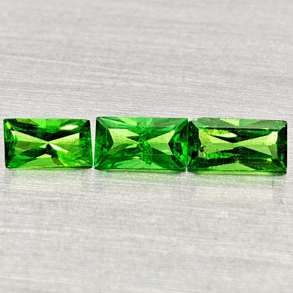 Natural Green Tsavorite Garnet 0.46 Ct. 3 Pcs Baguette Shape Gemstones From Tanzania: Product ID: 803005041 Product Name: Natural Tsavorite Weight: 0.46 CT. Size: 4 x 2.3 x 1.5 to 4.6 x 2.4 x 1.7 MM. Shape: Baguette Color: Green Clarity:SI1 Luster: Good Gems Origin: Tanzania Treatment: