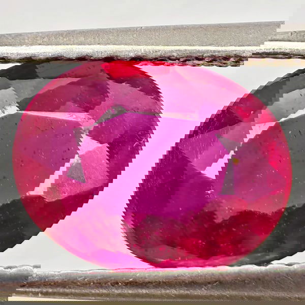 Natural Purplish Red Ruby 2.06 Ct. Oval Shape 9 x 7.1 Mm Gemstone From Madagascar: Product ID: 805935553 Product Name: Natural Ruby Weight: 2.06 CT. Size: 9 x 7.1 x 3.5 MM. Shape: Oval Color: Purplish Red Clarity:VSI Luster: Good Gems Origin: Madagascar Treatment: Heated (Lead-glass
