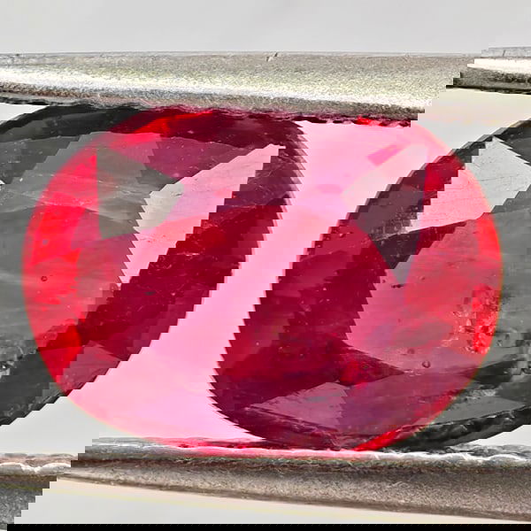 Natural Purplish Red Ruby 2.44 Ct. Oval Shape 9 x 6.7 Mm Gemstone From Madagascar: Product ID: 805935526 Product Name: Natural Ruby Weight: 2.44 CT. Size: 9 x 6.7 x 4.3 MM. Shape: Oval Color: Purplish Red Clarity:VSI Luster: Good Gems Origin: Madagascar Treatment: Heated (Lead-glass