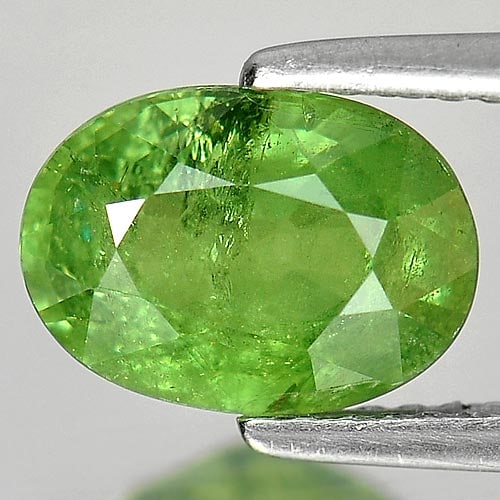 Natural Green Demantoid Garnet 2.45 Ct. Oval Shape 9.4 x 6.8 Mm Gemstone From Madagascar: Product ID: 802919329 Product Name: Natural Demantoid Weight: 2.45 CT. Size: 9.4 x 6.8 x 4.5 MM. Shape: Oval Color: Green Clarity:SI Luster: Good Gems Origin: Madagascar , Africa Treatment: Unheated C