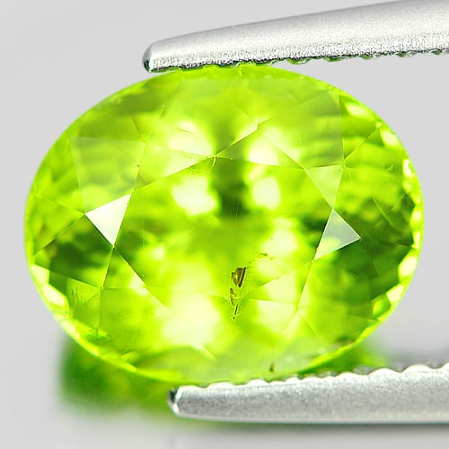 Natural Green Peridot 2.82 Ct. Oval Shape 9.5 x 7.6 Mm. Unheated Gemstone: Product ID: 805309988 Product Name: Natural Peridot Weight: 2.82 CT. Size: 9.5 x 7.6 x 5.7 MM. Shape: Oval Color: Green Clarity:SI Luster: Good Gems Origin: China Treatment: Unheated Crystal Structure