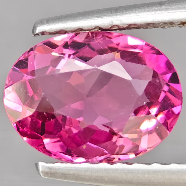 Natural Pink Tourmaline 1.57 Ct. Oval Shape 8.8 x 6.6 Mm Gemstone from Nigeria: Product ID: 807251349 Product Name: Natural Tourmaline Weight: 1.57 CT. Size: 8.8 x 6.6 x 4.3 MM. Shape: Oval Shape Color: Pink Clarity:VSI Luster: Good Gems Origin: Nigeria Treatment: Unheated Crysta