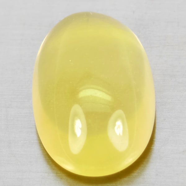 Natural Yellow Lemon Quartz 9.18 Ct.Oval Cabochon Shape 17.3 x 10.9 Mm Gemstone From Brazil: Product ID: 805530081 Product Name: Natural Quartz Weight: 9.18 CT. Size: 17.3 x 10.9 x 7.1 MM. Shape: Oval Cabochon Color: Yellow Clarity:Semi - Transparent Luster: Good Gems Origin: Brazil Treatment