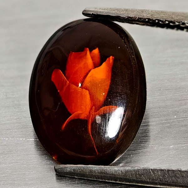 Natural Brown Yellow Amber 0.98 Ct. Flower Carving In Oval Cabochon 12.8 x 9.6 Mm Gemstone From: Product ID: 819091062 Product Name: Natural Amber Weight: 0.98 CT. Size: 12.8 x 9.6 x 3 MM. Shape: Oval Cabochon Color: Brown Yellow Clarity:Semi - Transparent Luster: Good Gems Origin: Poland Treatme