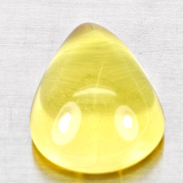 Natural Yellow Lemon Quartz 9.13 Ct. Pear Cabochon Shape 16.8 x 12 Mm Gemstone From Brazil: Product ID: 805530071 Product Name: Natural Quartz Weight: 9.13 CT. Size: 16.8 x 12 x 7.5 MM. Shape: Pear Cabochon Color: Yellow Clarity:None Luster: Good Gems Origin: Brazil Treatment: Unheated Cryst