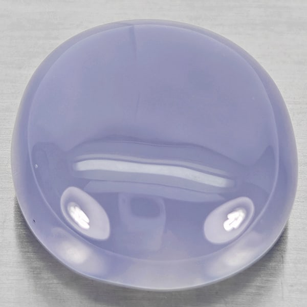 Natural Lavender Chalcedony 45.81 Ct. Oval Cabochon Shape 23 x 22 Mm Gemstone from Russia: Product ID: 801502667 Product Name: Natural Chalcedony Weight: 45.81 CT. Size: 23 x 22 x 11.8 MM. Shape: Oval Cabochon Color: Lavender Clarity:Semi - Transparent Luster: Good Gems Origin: Russia Treat