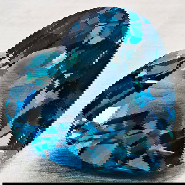 Natural London Blue Topaz 5.03 Ct. Heart Shape 11.5 x 10.9 Mm Gemstone From Brazil: Product ID: 807168387 Product Name: Natural Blue Topaz Weight: 5.03 CT. Size: 11.5 x 10.9 x 6 MM. Shape: Heart Shape Color: London Blue Clarity:VVS - VSI Luster: Good Gems Origin: Brazil Treatment: Tr