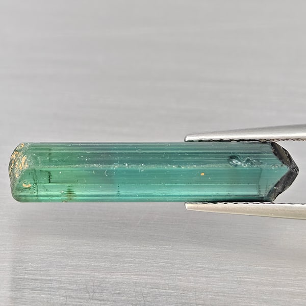 Natural Green Tourmaline 5.07 Ct. Rough Shape 23 x 5 Mm Gemstone from Nigeria: Product ID: 597200064 Product Name: Natural Tourmaline Weight: 5.07 CT. Size: 23 x 5 MM. Shape: Rough Shape Color: Green Clarity:None Luster: Good Gems Origin: Nigeria Treatment: Unheated Crystal Stru
