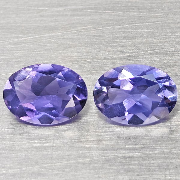 Natural Violetish Blue Iolite 1.29 Ct. 2 Pcs Oval Shape 7.2 x 5.3 Mm Gemstones From Madagascar: Product ID: 803804821 Product Name: Natural Iolite Weight: 1.29 CT. Size: 7.2 x 5.3 x 3.3 MM. Shape: Oval Shape Color: Violetish Blue Clarity:VSI Luster: Good Gems Origin: Madagascar Treatment: Unheat