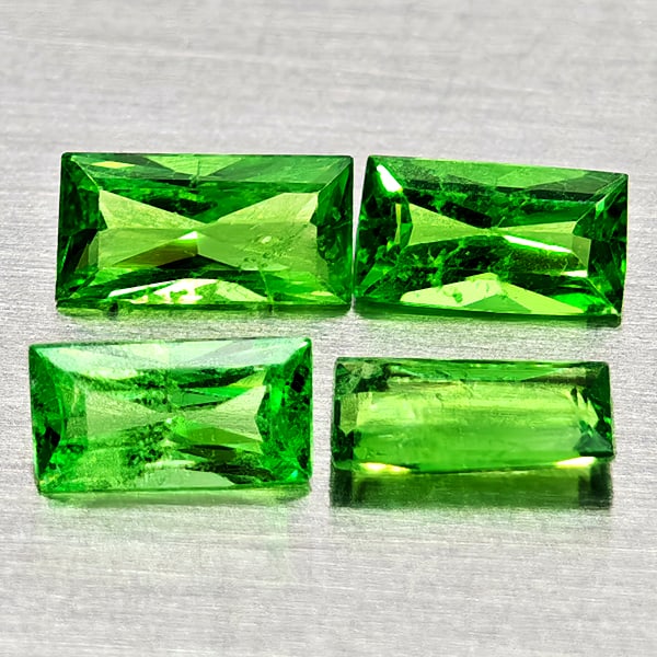 Natural Green Tsavorite Garnet 0.49 Ct. 4 Pcs Baguette Shape 4.2 x 2.1 Mm Gemstones From Tanzania: Product ID: 803005045 Product Name: Natural Tsavorite Weight: 0.49 CT. Size: 4.2 x 2.1 x 1.5 MM. Shape: Baguette Color: Green Clarity:SI1 Luster: Good Gems Origin: Tanzania Treatment: Unheated Crystal