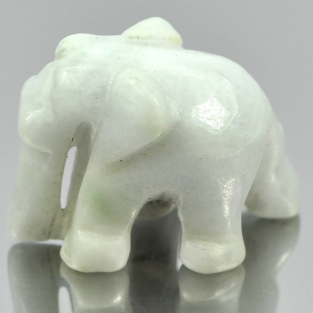 Natural White Jade 47.66 Ct. Elephant Carving Shape 25 x 19 Mm Gemstone From Thailand: Product ID: 819813032 Product Name: Natural Jade Weight: 47.66 CT. Size: 25 x 19 x 15 MM. Shape: Elephant Carving Color: White Clarity:Opaque Luster: Good Gems Origin: Thailand Treatment: Unheated Cry