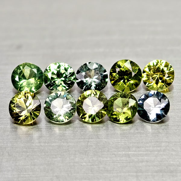 Natural Green Sapphire 1.49 Ct. 10 Pcs Round Diamond Cut 3.2 Mm Gemstones From Thailand: Product ID: 806162491 Product Name: Natural Green Sapphire Weight: 1.49 CT. Size: 3.2 x 3.2 x 2.2 MM. Shape: Round Diamond Cut Color: Green Clarity:VSI Luster: Good Gems Origin: Thailand Treatment: He