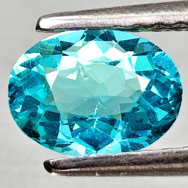 Natural Paraiba Color Apatite 0.81 Ct. Oval Shape 7 x 5.3 Mm Gemstones From Tanzania: Product ID: 800613704 Product Name: Natural Apatite Weight: 0.81 CT. Size: 7 x 5.3 x 3.3 MM. Shape: Oval Color: Neon Blue Clarity:VSI Luster: Good Gems Origin: Tanzania Treatment: Unheated Crystal Str