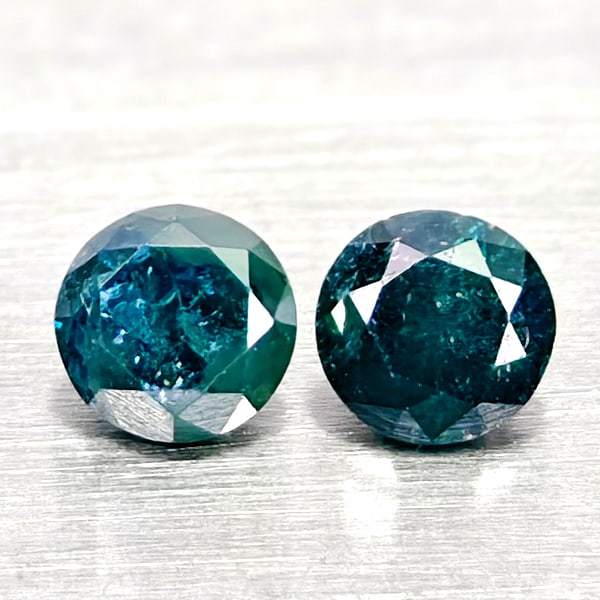 Natural Blue Diamond 0.23 Ct. 2 Pcs. Round Diamond Cut 2.8 Mm. From Belgium: Product ID: 502100356 Product Name: Natural Natural Diamond Weight: 0.23 CT. Size: 2.8 x 2.8 x 1.9 MM. Shape: Round Diamond Cut Color: Blue Clarity:SI1 Luster: Good Gems Origin: Belgium Treatment: Tre