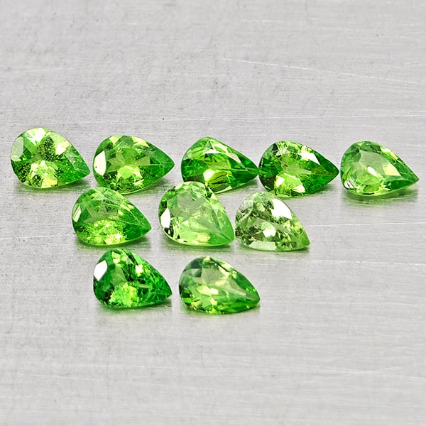 Natural Green Tsavorite Garnet 1.32 Ct. 10 Pcs Pear Shape 4.3 x 2.8 Mm Gemstones From Tanzania: Product ID: 803005100 Product Name: Natural Tsavorite Weight: 1.32 CT. Size: 4.2 x 2.8 x 1.5 MM. Shape: Pear Shape Color: Green Clarity:SI Luster: Good Gems Origin: Tanzania Treatment: Unheated Crysta