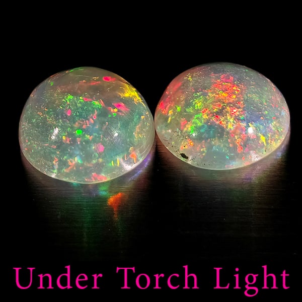 Natural Multi Color Opal 1.59 Ct. 2 Pcs Round Cabochon Shape 7.1 Mm Gemstones From Ethiopia: Product ID: 818728154 Product Name: Natural Opal Weight: 1.59 CT. Size: 7.1 x 7.1 x 3.7 MM. Shape: Round Cabochon Color: Multi-Color Clarity:Semi - Transparent Luster: Good Gems Origin: Ethiopia Treat