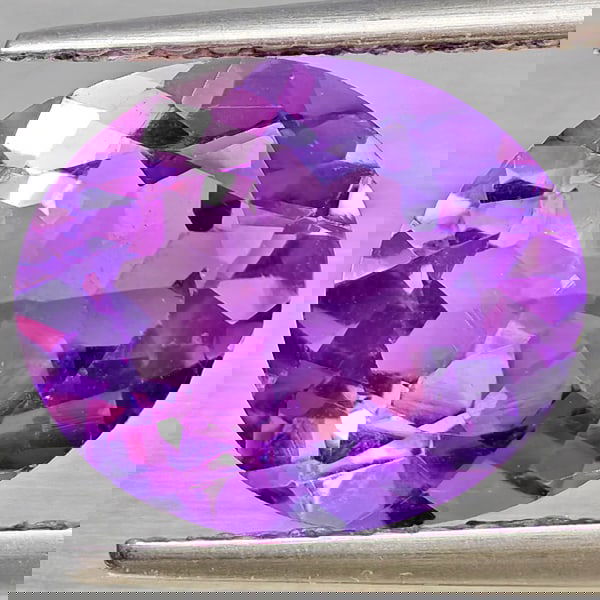 Natural Purple Amethyst 3.09 Ct. Oval Shape 11 x 9 Mm Gemstone from Brazil: Product ID: 800325539 Product Name: Natural Amethyst Weight: 3.09 CT. Size: 11 x 9 x 5.8 MM. Shape: Oval Color: Purple Clarity:VSI Luster: Good Gems Origin: Brazil Treatment: Unheated Crystal Structur