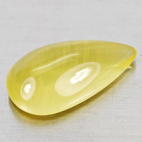 Natural Yellow Lemon Quartz 17.69 Ct. Pear Cabochon Shape 24 x 13.4 Mm Gemstone from Brazil: Product ID: 805530031 Product Name: Natural Quartz Weight: 17.69 CT. Size: 24 x 13.4 x 9 MM. Shape: Pear Cabochon Color: Yellow Lemon Clarity:Semi - Transparent Luster: Good Gems Origin: Brazil Treatm