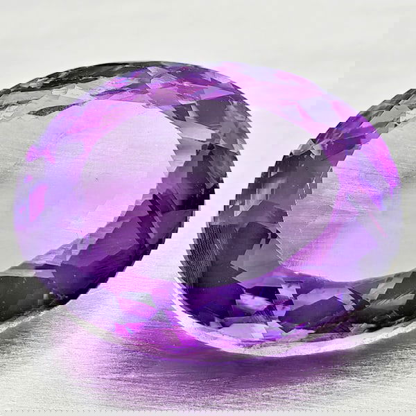 Natural Purple Amethyst 7.53 Ct. Oval Shape 14.3 x 11.3 Mm Gemstone from Brazil: Product ID: 800325388 Product Name: Natural Amethyst Weight: 7.53 CT. Size: 14.3 x 11.3 x 7 MM. Shape: Oval Color: Purple Clarity:VVS - VSI Luster: Good Gems Origin: Brazil Treatment: Unheated Crystal