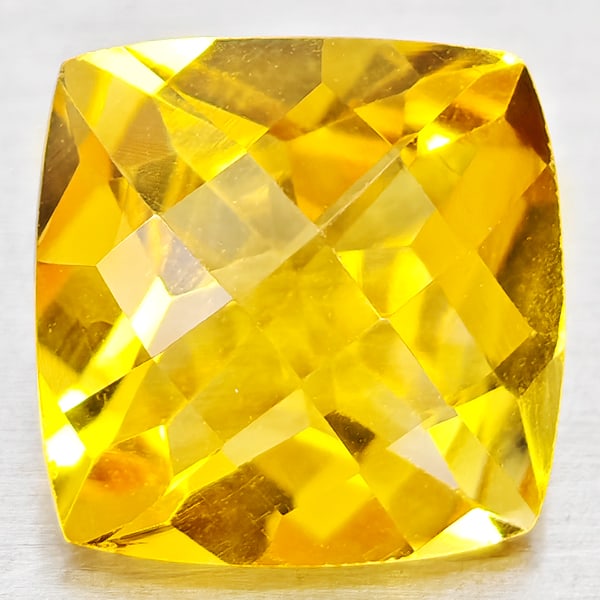 Natural Yellow Citrine 3.99 Ct. Cushion Checkerboard Cut 10.2 Mm. Gemstone From Brazil: Product ID: 801815211 Product Name: Natural Citrine Weight: 3.99 CT. Size: 10.2 x 10.2 x 6.5 MM. Shape: Cushion Checkerboard Cut Color: Yellow Clarity:VVS - VSI Luster: Good Gems Origin: Brazil Treatm