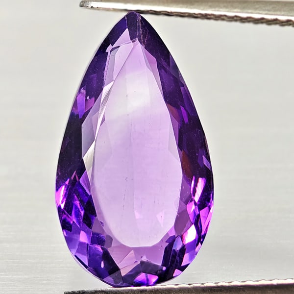Natural Purple Amethyst 7.82 Ct. Pear Shape 17.6 x 10 Mm Gemstone From Brazil: Product ID: 800325464 Product Name: Natural Amethyst Weight: 7.82 CT. Size: 17.6 x 10 x 7 MM. Shape: Pear Shape Color: Purple Clarity:VSI Luster: Good Gems Origin: Brazil Treatment: Unheated Crystal S