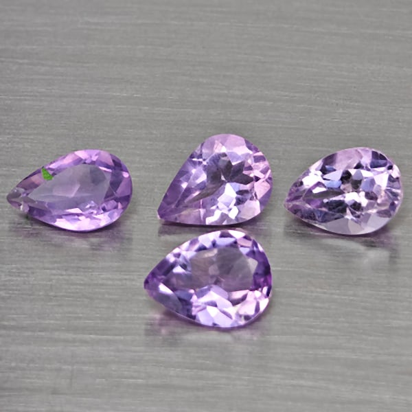 Natural Purple Amethyst 3.10 Ct. 4 Pcs Pear Shape 7.4 x 6 Mm Gemstone from Brazil: Product ID: 800316344 Product Name: Natural Amethyst Weight: 3.10 CT. Size: 7.4 x 6 x 3.4 MM. Shape: Pear Color: Purple Clarity:VSI Luster: Good Gems Origin: Brazil Treatment: Unheated Crystal Structu