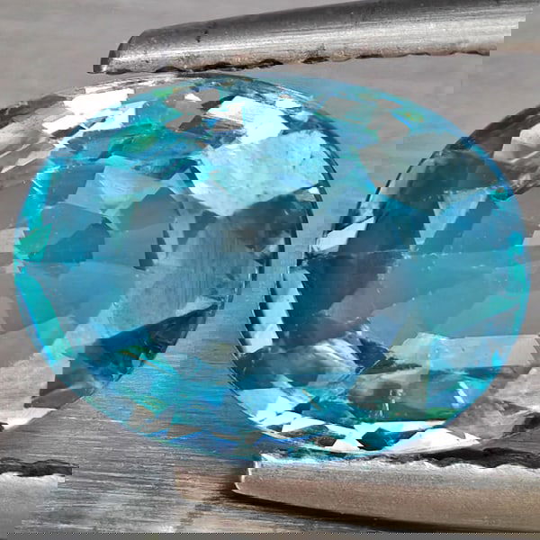 Natural Blue Zircon 2.87 Ct. Oval Shape 9.5 x 7.3 Mm Gemstone from Cambodia: Product ID: 807743075 Product Name: Natural Zircon Weight: 2.87 CT. Size: 9.5 x 7.3 x 4 MM. Shape: Oval Shape Color: Blue Clarity:VSI Luster: Good Gems Origin: Cambodia Treatment: Heated Crystal Struc