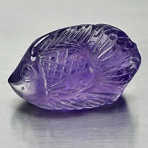 Natural Violet Amethyst 10.74 Ct. Fish Carving Unheated Gemston From Brazil: Product ID: 810302429 Product Name: Natural Amethyst Weight: 10.74 CT. Size: 20 x 13.5 x 7.2 MM. Shape: Carving Fish Color: Violet Clarity:Semi - Transparent Luster: Good Gems Origin: Brazil Treatment