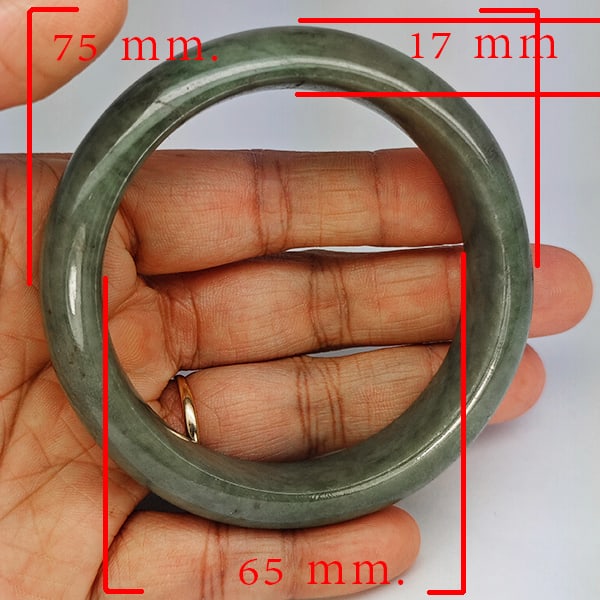 Natural Genuine Mulit Color Jade 482.96 Ct. Bangle Round Shape 75 x 65 Mm Gemstone from Thailand: Product ID: 819816095 Product Name: Natural Gemstones Weight: 482.96 CT. Size: 75 x 65 x 17 MM. Shape: Round Shape Color: Multi-Color Green Clarity:Opaque Luster: Good Gems Origin: Thailand Treatment:
