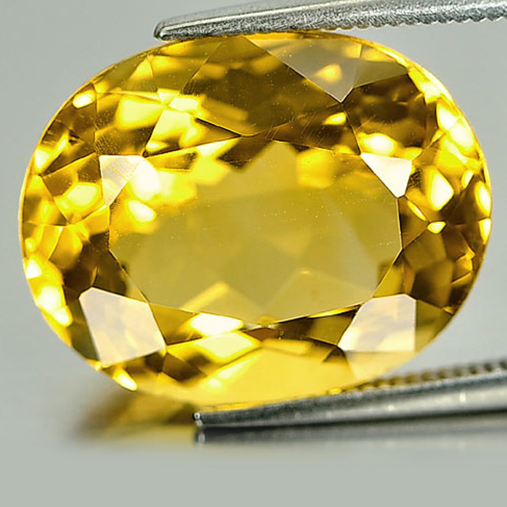 Natural Yellow Citrine 13.26 Ct. VVS Oval Shape 17.4 x 13.9 Mm. Gemstone Unheated From Brazil: Product ID: 801810108 Product Name: Natural Citrine Weight: 13.26 CT. Size: 17.4 x 13.9 x 9.5 MM. Shape: Oval Color: Yellow Clarity:VVS Luster: Good Gems Origin: Brazil Treatment: Unheated Crystal Str
