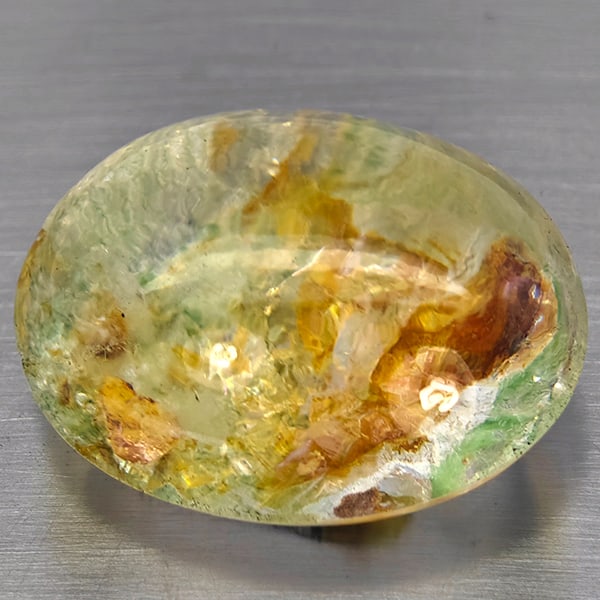 Natural Moss Quartz 55.92 Ct. Oval Cabochon Shape 26 x 20 Mm Gemstone From Thailand: Product ID: 819601154 Product Name: Natural Quartz Weight: 55.92 CT. Size: 26 x 20 x 15.6 MM. Shape: Round Cabochon Color: White Brown Clarity:Semi - Transparent Luster: Good Gems Origin: Thailand Tre