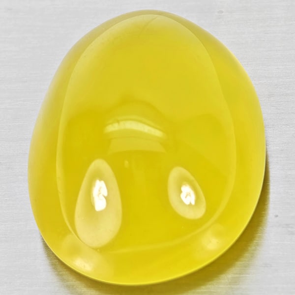 Natural Yellow Lemon Quartz 114.31 Ct. Oval Cabochon Shape 33 x 27 Mm Gemstone From Brazil: Product ID: 805529999 Product Name: Natural Quartz Weight: 114.31 CT. Size: 33 x 27 x 19 MM. Shape: Oval Cabochon Color: Yellow Lemon Clarity:Semi - Transparent Luster: Good Gems Origin: Brazil Treatm