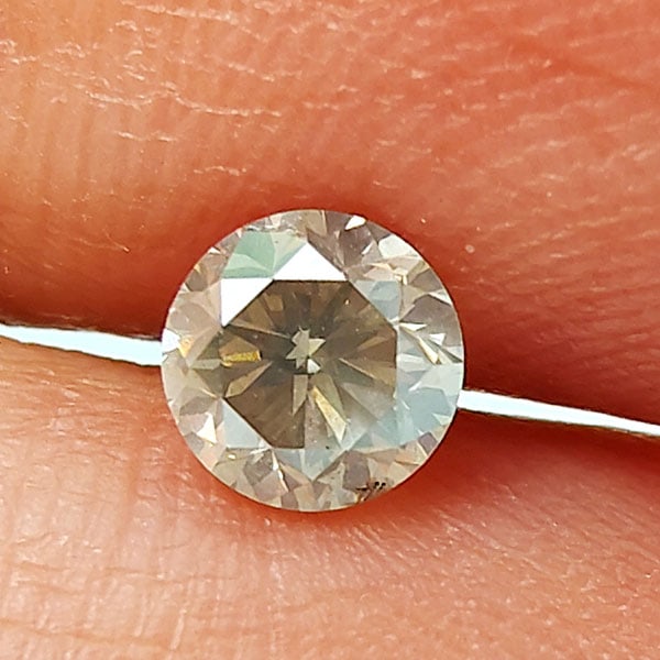 Natural Loose Diamond 0.52 Ct. Round Brilliant Cut 4.8 Mm. From Belgium: Product ID: 502100060 Product Name: Natural Enhanced Diamond Weight: 0.52 CT. Size: 4.8 x 4.8 x 3.2 MM. Shape: Round Brilliant Cut Color: G Clarity:I1 Luster: Scintillating Gems Origin: Belgium Treatm