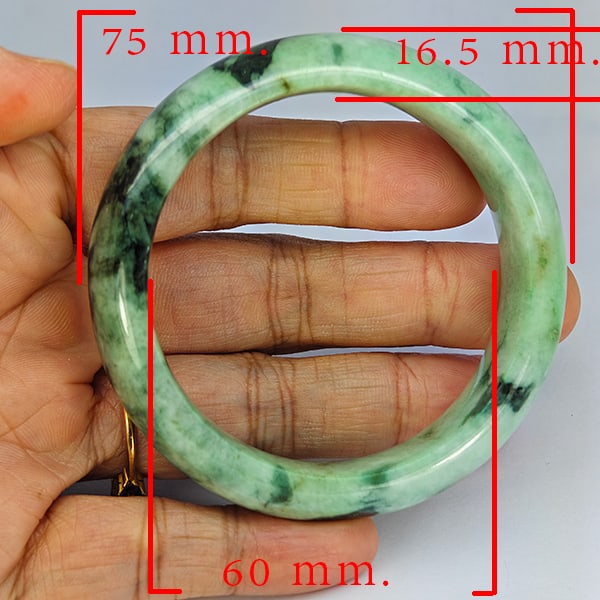 Natural Green Jade Bangle 384.19 Ct Diameter 75 x 60 Mm. Gemstone from Thailand: Product ID: 819816144 Product Name: Natural Gemstones Weight: 384.19 CT. Size: 75 x 60 x 16.5 MM. Shape: Round Color: Multi-Color Green Clarity:Opaque Luster: Good Gems Origin: Thailand Treatment: Unh