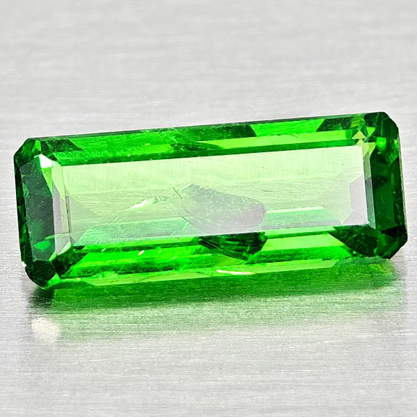 Natural Green Tsavorite Garnet 1.18 Ct. Octagon Shape 9.6 x 2.8 Mm Gemstone From Tanzania: Product ID: 803005063 Product Name: Natural Tsavorite Weight: 1.18 CT. Size: 9.6 x 2.8 x 2.8 MM. Shape: Octagon Color: Green Clarity:SI1 Luster: Good Gems Origin: Tanzania Treatment: Unheated Crystal