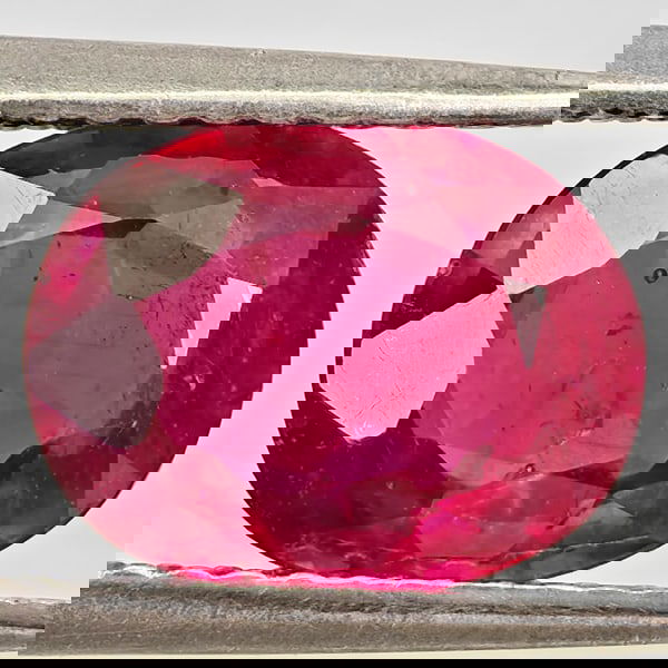 Natural Purplish Red Ruby 2.28 Ct. Oval Shape 9.2 x 7.2 Mm Gemstone From Madagascar: Product ID: 805935610 Product Name: Natural Ruby Weight: 2.28 CT. Size: 9.2 x 7.2 x 3.8 MM. Shape: Oval Color: Purplish Red Clarity:VSI Luster: Good Gems Origin: Madagascar Treatment: Heated (Lead-gla