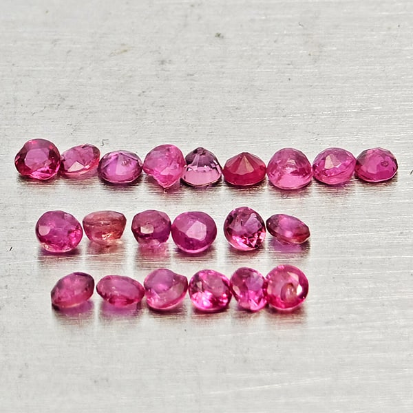 Natural Pinkish Red Ruby 0.59 Ct. 20 Pcs Round Shape 1.8 Mm Gemstones From Thailand: Product ID: 805935435 Product Name: Natural Ruby Weight: 0.59 CT. Size: 1.8 x 1.8 x 1 MM. Shape: Round Shape Color: Pinkish Red Clarity:VSI - SI1 Luster: Good Gems Origin: Thailand Treatment: Heated C