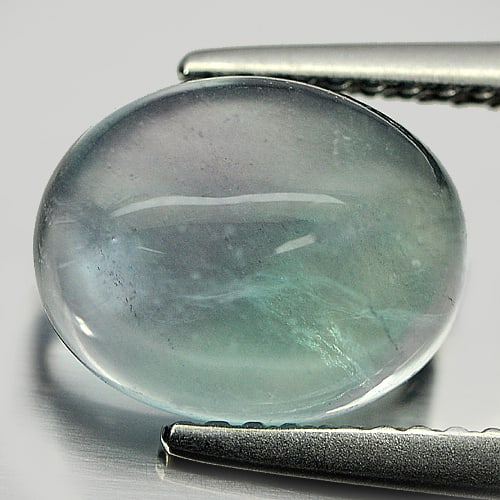 Natural Multi-Color Fluorite 3.52 Ct. Oval Cabochon Shape 10 x 8 Mm. Gemstone From Brazil: Product ID: 802706069 Product Name: Natural Fluorite Weight: 3.52 CT. Size: 10 x 8 x 4.3 MM. Shape: Oval Cabochon Color: Multi-Color Clarity:Semi - Transparent Luster: Good Gems Origin: Brazil Treatme