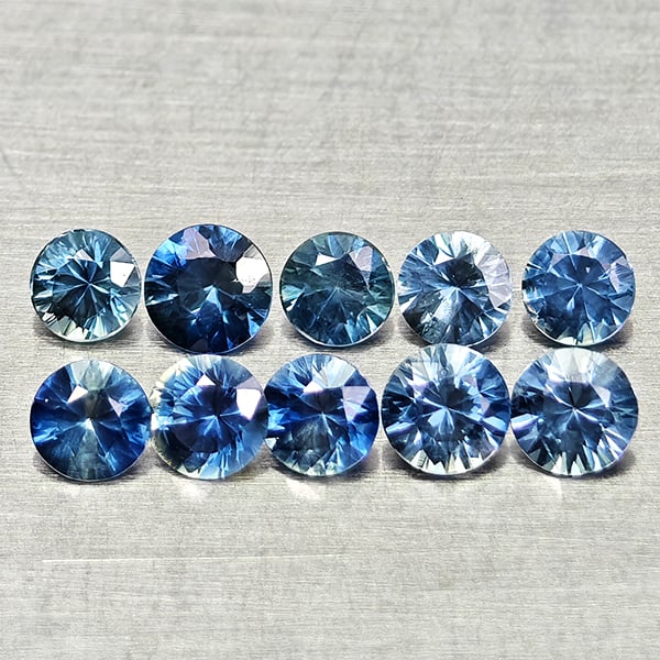 Natural Blue Sapphire 0.73 Ct. 10 Pcs Round Diamond Cut 2.4 Mm Gemstones From Madagascar: Product ID: 806162613 Product Name: Natural Blue Sapphire Weight: 0.73 CT. Size: 2.4 x 2.4 x 1.6 MM. Shape: Round Diamond Cut Color: Blue Clarity:VVS Luster: Good Gems Origin: Madagascar Treatment: He
