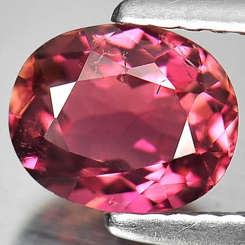 Natural Purplish Pink Tourmaline 1.17 Ct. Oval Shape 7.3 x 6 Mm. Gemstone From Nigeria: Product ID: 807236353 Product Name: Natural Tourmaline Weight: 1.17 CT. Size: 7.3 x 6 x 3.9 MM. Shape: Oval Color: Purplish Pink Clarity:SI Luster: Good Gems Origin: Nigeria Treatment: Unheated Crysta