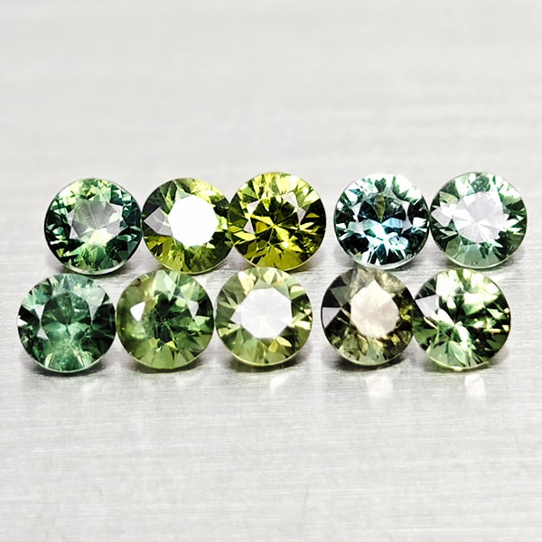 Natural Green Sapphire 1.52 Ct. 10 Pcs Round Diamond Cut Gemstones From Thailand: Product ID: 806162489 Product Name: Natural Green Sapphire Weight: 1.52 CT. Size: 3.2 x 3.2 x 2.2 to 3.1 x 3.1 x 2.2 MM. Shape: Round Diamond Cut Color: Green Clarity:VSI Luster: Good Gems Origin: Tha