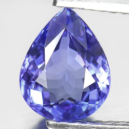 Natural Violetish Blue Tanzanite 1.22 Ct. VS Pear Shape 8 x 6.4 Mm. Gemstone From Tanzania: Product ID: 807006364 Product Name: Natural Tanzanite Weight: 1.22 CT. Size: 8 x 6.4 x 3.6 MM. Shape: Pear Color: Blue Clarity:VS Luster: Very Good Gems Origin: Tanzania Treatment: Heated Crystal Stru