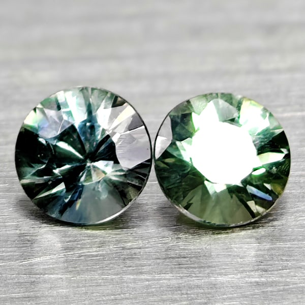 Natural Multi Color Sapphire 0.36 Ct. 2 Pcs Round Diamand Cut 3.3 Mm. Gemstones From Tanzania: Product ID: 806162240 Product Name: Natural Green Sapphire Weight: 0.36 CT. Size: 3.3 x 3.3 x 2.3 MM. Shape: Round Diamond Cut Color: Fancy Color Clarity:VSI Luster: Very Good Gems Origin: Tanzania Tr