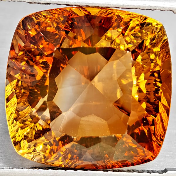 Natural Imperial Topaz 16.82 Ct. Cushion Concave Cut 14.4 x 14 Mm Gemstone From Brazil: Product ID: 807168630 Product Name: Natural Topaz Weight: 16.82 CT. Size: 14.4 x 14 x 10.1 MM. Shape: Cushion Concave Cut Color: Imperial Clarity:VSI Luster: Good Gems Origin: Brazil Treatment: Treate