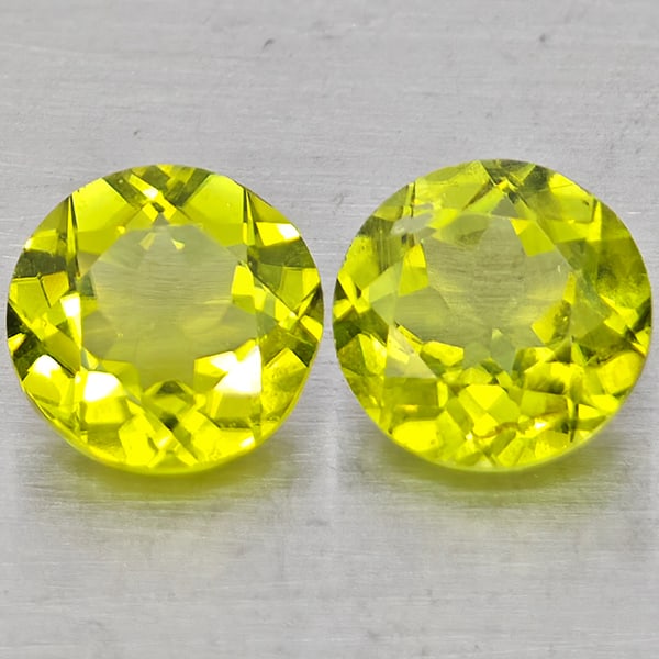 Natural Green Peridot 1.55 Ct. 2 Pcs Round Shape 5.9 Mm Gemstones from Pakistan: Product ID: 805317502 Product Name: Natural Rhodolite Weight: 1.55 CT. Size: 5.9 x 5.9 x 3.4 MM. Shape: Round Color: Green Clarity:VSI Luster: Good Gems Origin: Pakistan Treatment: Unheated Crystal St