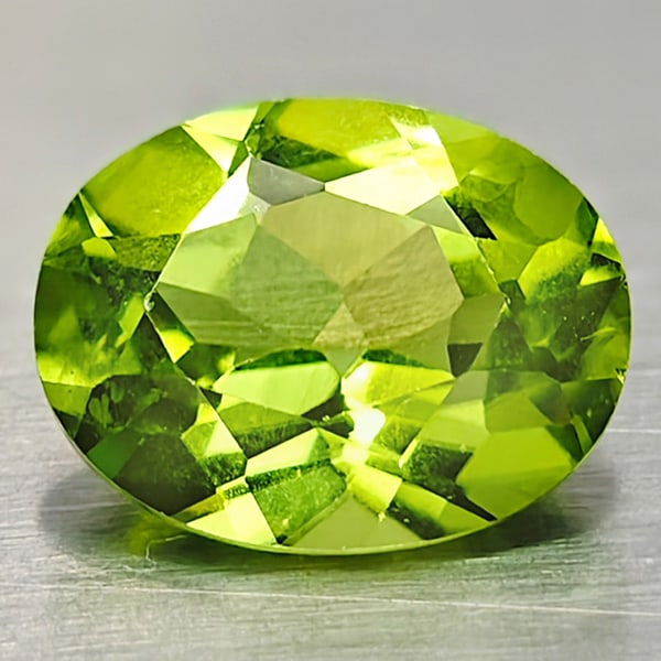 Natural Green Peridot 2.16 Ct. Oval Shape 7 x 9.2 Mm. Gemstone From Pakistan: Product ID: 805316937 Product Name: Natural Peridot Weight: 2.16 CT. Size: 7 x 9.2 x 4.6 MM. Shape: Oval Color: Green Clarity:VSI Luster: Good Gems Origin: Pakistan Treatment: Unheated Crystal Structu